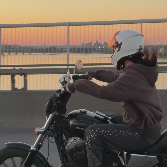 CMPLX hoodie worn on motorcycle in motion at sunset, Complex Paradox streetwear