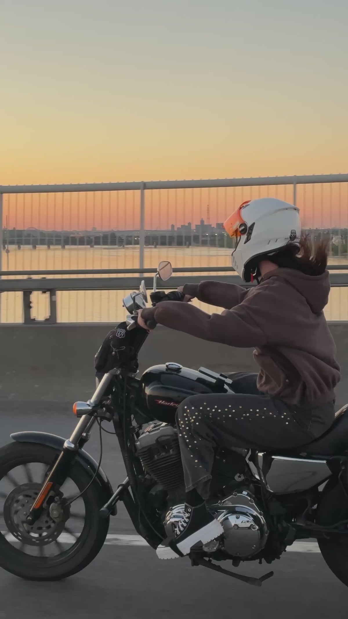 CMPLX hoodie worn on motorcycle in motion at sunset, Complex Paradox streetwear